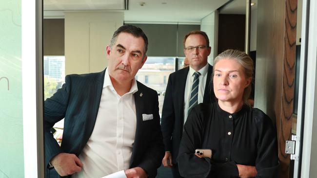 Virgin Australia CEO Paul Scurrah (left), administrator Vaughan Strawbridge of Deloitte(right rear) and a media advisor(female right). They will try to restructure the airline's $5bn debt and bring it back to life. Picture: John Feder