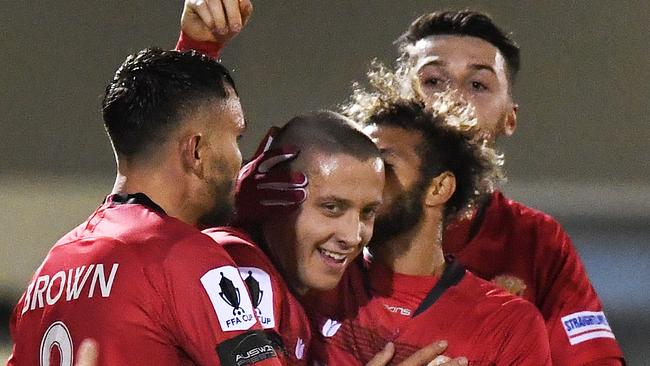 Hume City’s Marko Delic celebrates scoring the first of his three goals against Adelaide Olympic. Picture: Getty Images