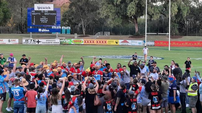 The Swifts huddle of elation that formed on the North Ipswich Reserve field after the A-Grade team's grand final success. Picture: David Lems