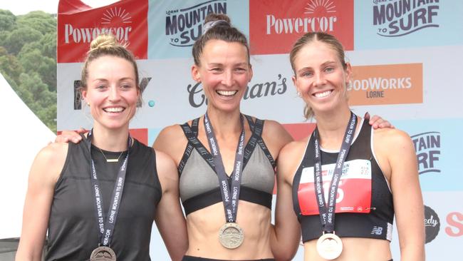 Mountain to Surf open women's winner Sarah Klein (middle) with runner-ups, Amy Robinson and Annabelle Eastman. Picture: Meg Saultry