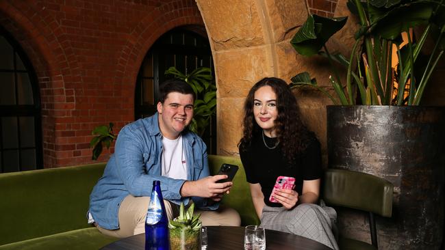 Patrick Blacker and Aaliyah Johnston, both 20, are among Generations Z’s phone enthusiasts but in different ways. Picture: NCA Newswire/ Gaye Gerard