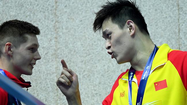 ‘You loser, I’m winning’... Sun Yang taunts ‘Team Mack’ Brit swimmer Duncan Scott. Picture: Getty