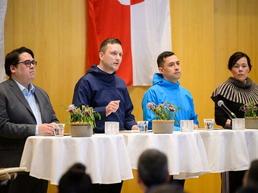 Greenland politician Aqqalu Jerimiassen, Jens-Frederik Nielsen the leader of the Demokraatit party and next Prime Minister, the Prime Minister of Greenland Mute Bourup Egede and Vivian Motzfeldt of the Siumut party attend the announcement of a coalition agreement to form the next government. Picture: Getty Images