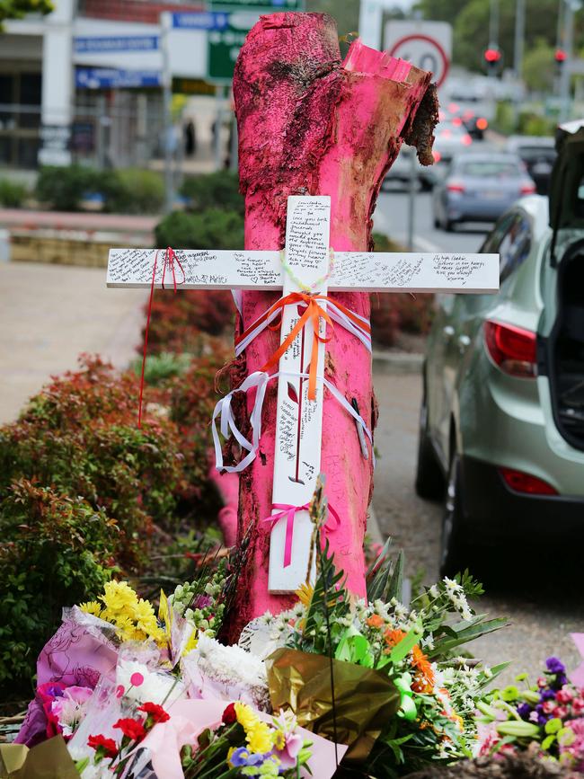 Mourners left a cross on the tree at the scene of a double fatal car crash at Nerang earlier this year. Picture: Luke Marsden.