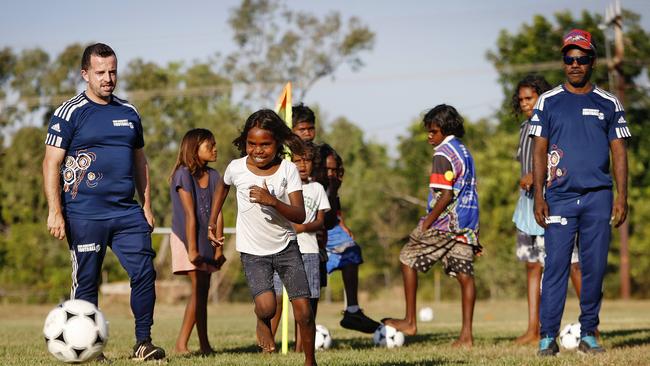 A football star in the making overseen by local coaches from the local Indigenous community. Picture: Sam Ruttyn