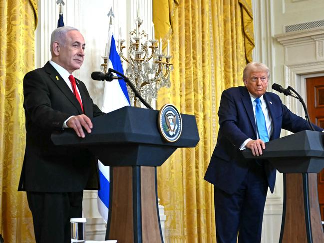 US President Donald Trump (R) and Israel's Prime Minister Benjamin Netanyahu take questions during a press conference in the East Room of the White House in Washington, DC, on February 4, 2025. (Photo by ANDREW CABALLERO-REYNOLDS / AFP)