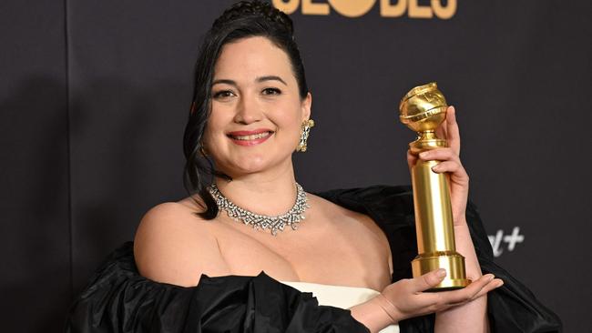 Lily Gladstone poses with her Golden Globe for best performance by a female actor in a movie for Killers of the Flower Moon. Picture: AFP