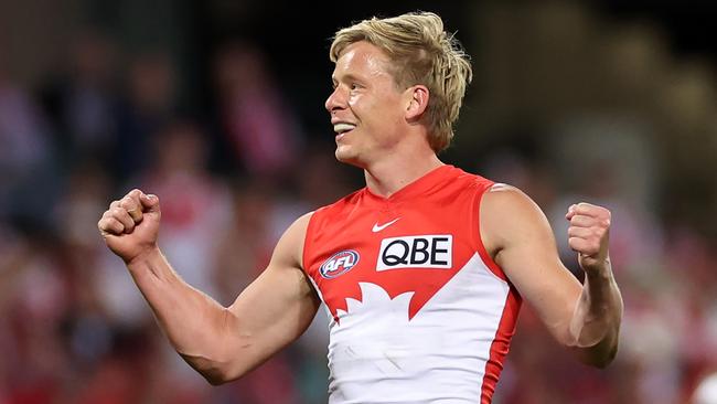 SYDNEY, AUSTRALIA - SEPTEMBER 20: Isaac Heeney of the Swans celebrates kicking a goal during the AFL Preliminary Final match between Sydney Swans and Port Adelaide Power at Sydney Cricket Ground, on September 20, 2024, in Sydney, Australia. (Photo by Cameron Spencer/Getty Images)