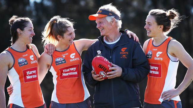 New AFLW coach for the GWS Giants women's team Alan McConnell with players Renee Forth, Maddy Collier and Emma Swanson. MCConnell has been an assistant with the men's AFL side. Picture. Phil Hillyard