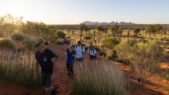 Heath Garratt of the Tasmanian Walking Company walking around Uluru-Kata Tjuta National Park. Picture: Helen Orr