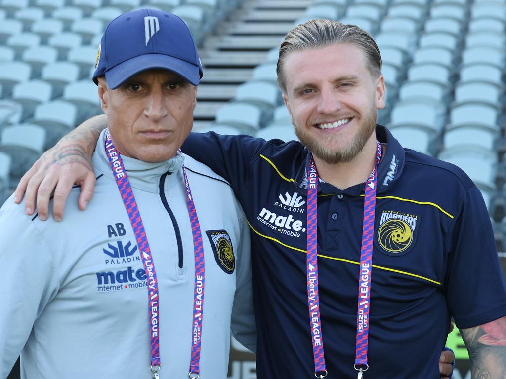Chief vibes manager Andy Bernal (L) with Jason Cummings. Picture: Scott Gardiner/Getty Images