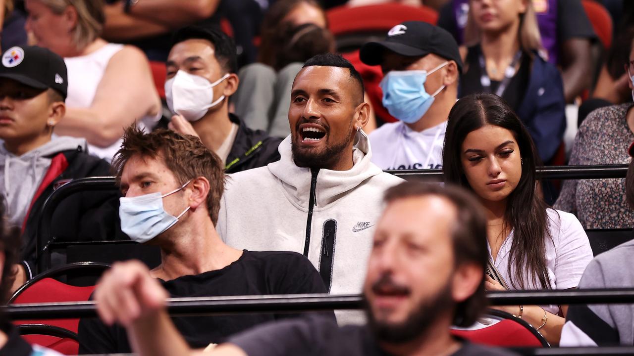 Nick Kyrgios and Costeen Hatzi watching the NBL in Sydney. Picture: Getty Images.