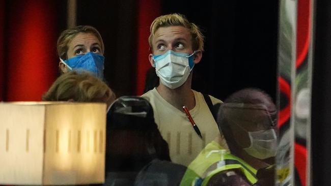 International travellers wait to check in at a quarantine hotel in Melbourne. Picture: AAP Image/Scott Barbour