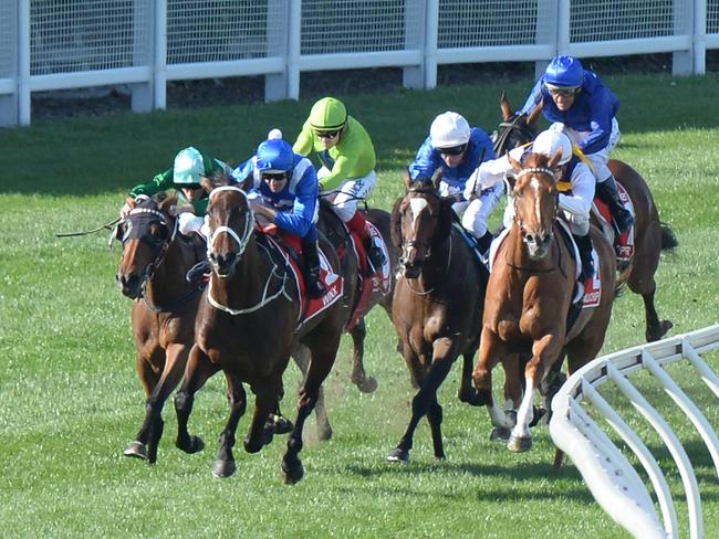 Jockey Hugh Bowman and Winx turn for home in the Cox Plate. Picture: AAP