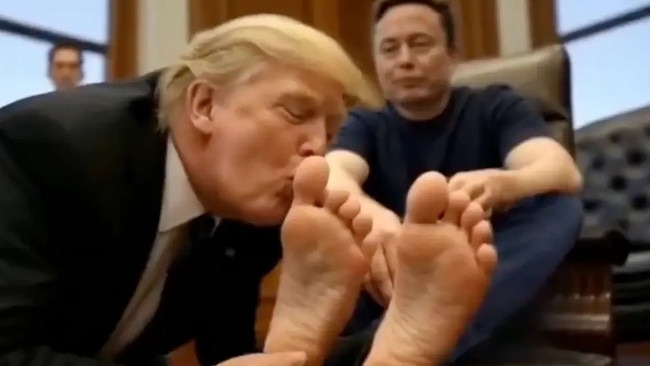 ** AI generated image ** Hackers have played images doctored by AI showing President Donald Trump kissing the feet of Elon Musk on video screens across to US federal departments. , Screens throughout the Department of Housing and Urban Development’s headquarters hacked into to display the images with the text “Long live the real king. took over video screens across two US federal departments have been hacked taken over by images purporting to show ” SUPPLIED