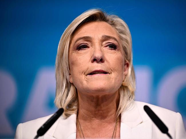 French far-right Rassemblement National (RN) party leader Marine Le Pen addresses militants after French President announced he is calling for new general elections on June 30, during an evening gathering on the final day of the European Parliament election, at the Pavillon Chesnaie du Roy in Paris, on June 9, 2024. (Photo by JULIEN DE ROSA / AFP)