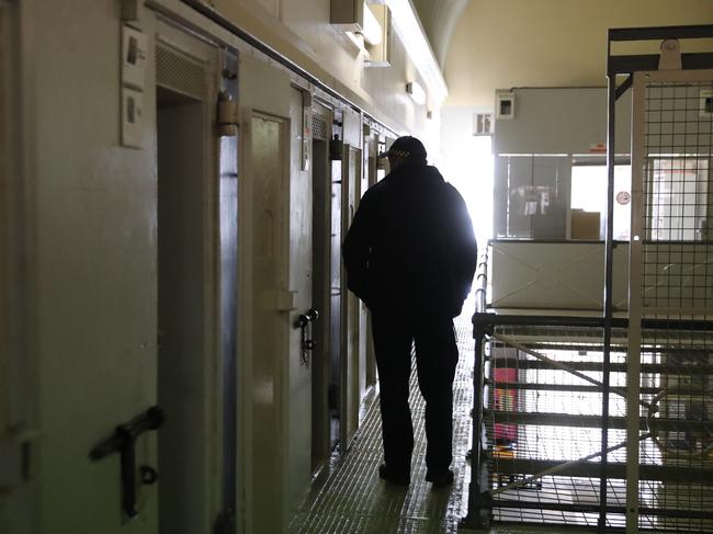 A Goulburn Jail prison officer walks through “The Boneyard”, which houses some of Australia’s most notorious offenders, such as the Cobby killers. Picture: Tim Hunter