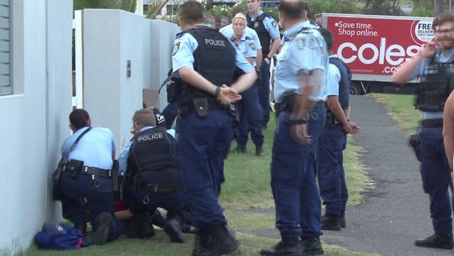 Police officers arrest one of the teens at the scene on Monday night. Picture: TNV