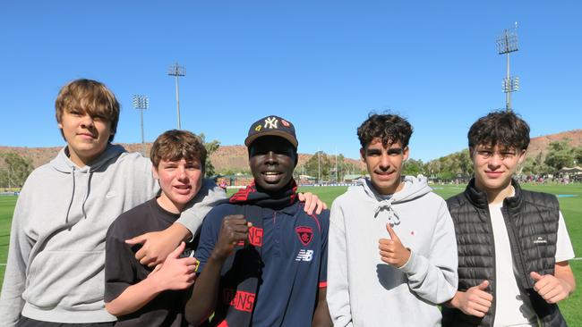 Jahyke, Fletcha, Bhan, Mitchell and Deng. These Alice Springs locals say they come to game every year to see their favourite Demon Christian Petracca.