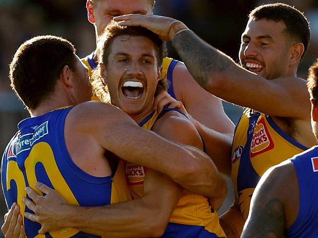 PERTH, AUSTRALIA - MARCH 01:  Liam Baker of the Eagles celebrates the winning goal during the 2025 AAMI AFL Community Series match between West Coast Eagles and North Melbourne Kangaroos at Hands Oval on March 01, 2025 in Bunbury, Australia. (Photo by James Worsfold/Getty Images)