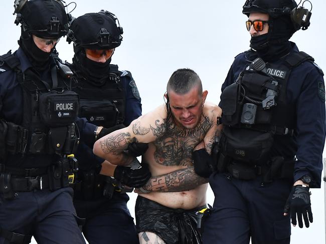 A man has surrendered himself to police following a boat standoff on the Sunshine Coast after he allegedly crashed a car through a home with teary owners saying it sounded like a bomb going off. Picture: Patrick Woods.