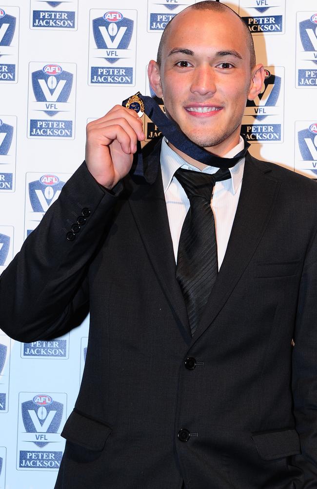 Alex Woodward with the 2014 Liston  Trophy.