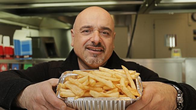 John Paradisis of Legs 'N' Breasts in Salamanca with a tray of some of their much sought-after hot chips. Picture: MATHEW FARRELL