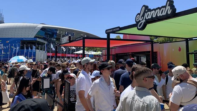 Punters line up for charcoal chicken at El Jannah's Australian Open store. Picture: Heath Parkes-Hupton