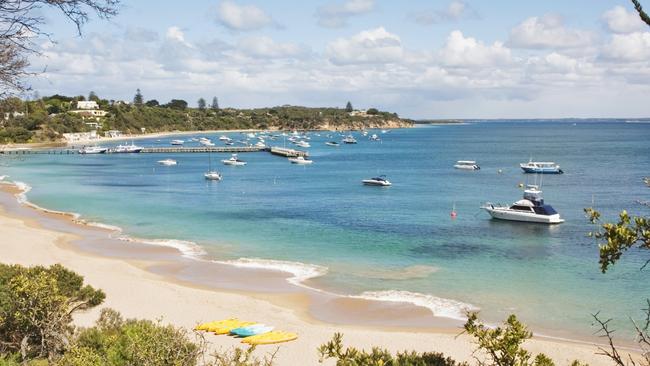 Three men rescued from capsized boat off Nepean Bay | Herald Sun