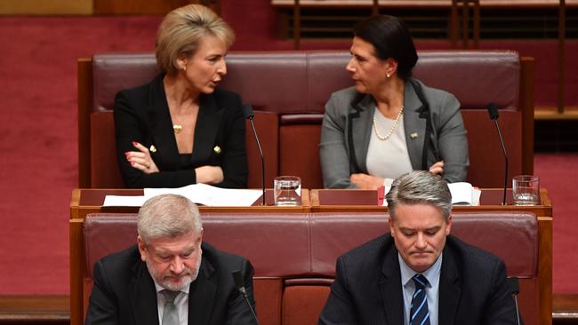 Former Cabinet ministers Michaelia Cash, Concetta Fierravanti-Wells Mitch Fifield and Mathias Cormann sit on the backbench during Senate Question Time. Picture: AAP.