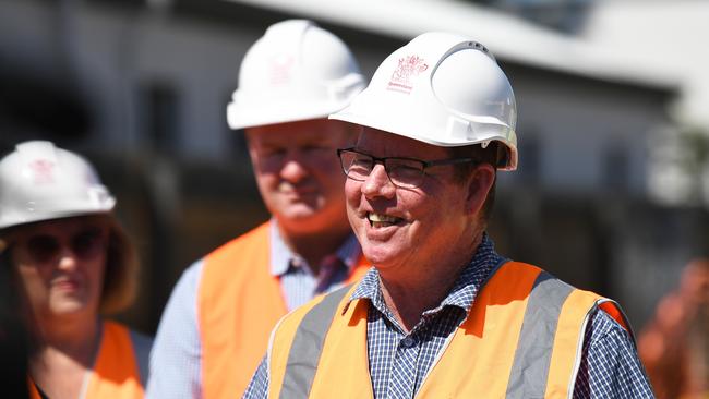 Rockhampton MP Barry ORourke turns a sod on their new $3.3 million social housing project at 102 Campbell Street in Rockhamptons inner-city area.