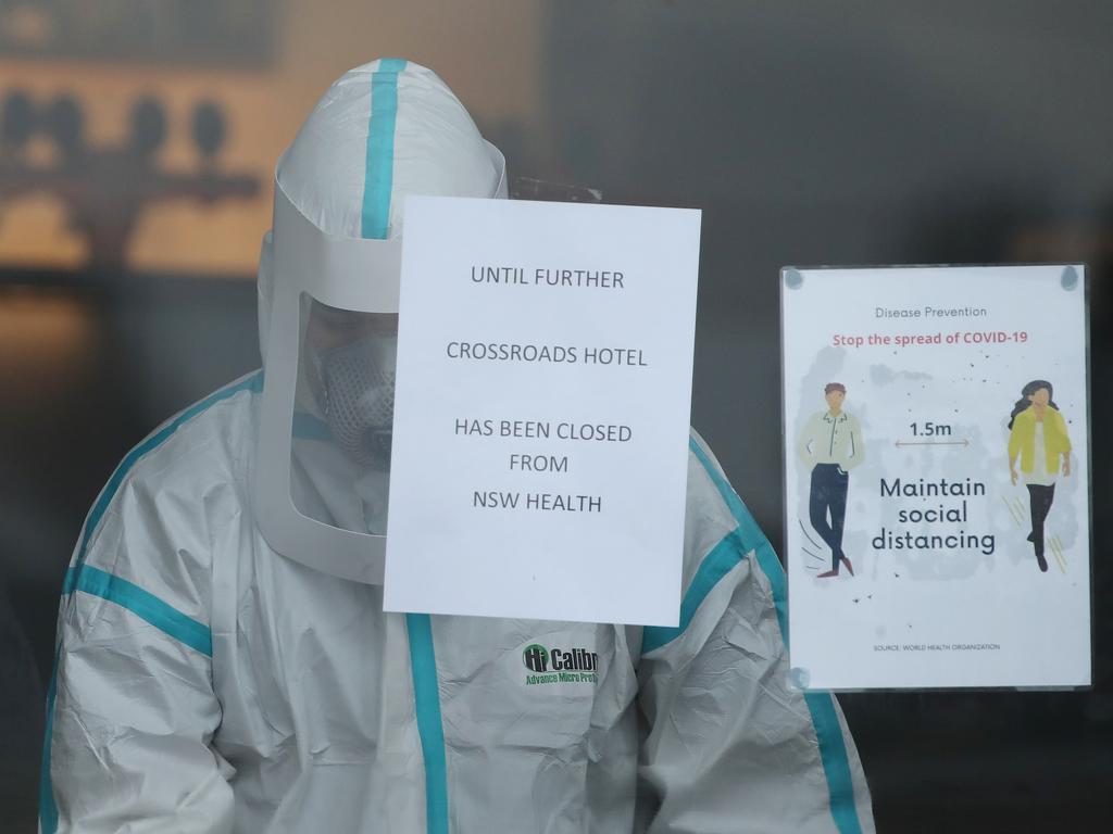 Cleaners are pictured inside the hotel. Picture: David Swift