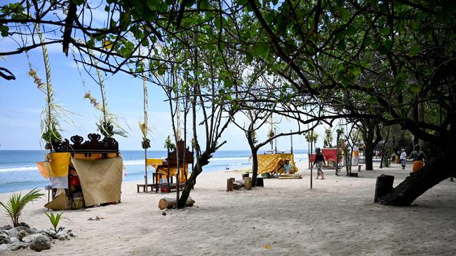 A near-empty beach in Kuta on Indonesia's resort island of Bali in March when the pandemic began to affect tourism. Picture: AFP