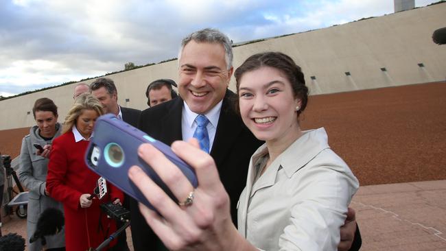 Budget 2015: Job ID PD462278. Anika Buining (0414211270) from the Hunter Valley ceased the opportunity for a selfie with Joe Hockey. The Treasurer of Australia Joe Hockey on Budget Day morning in Canberra. Tuesday 12th May 2015. Pic by Gary Ramage