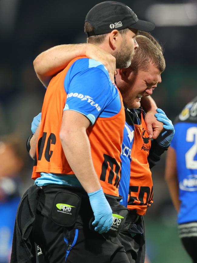 Tom Robertson of the Force gets assistance off the field after getting injured during the round 13 Super Rugby Pacific match between Western Force and ACT Brumbies at HBF Park, on May 20, 2023, in Perth, Australia. (Photo by James Worsfold/Getty Images)