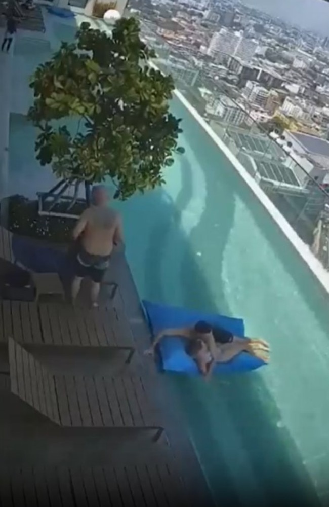 A couple was seen chilling in the pool at a high-rise building in Bangkok
