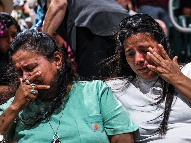 People mourn as they attend the vigil for the victims of the mass shooting at Robb Elementary School in Uvalde, Texas. Picture: AFP