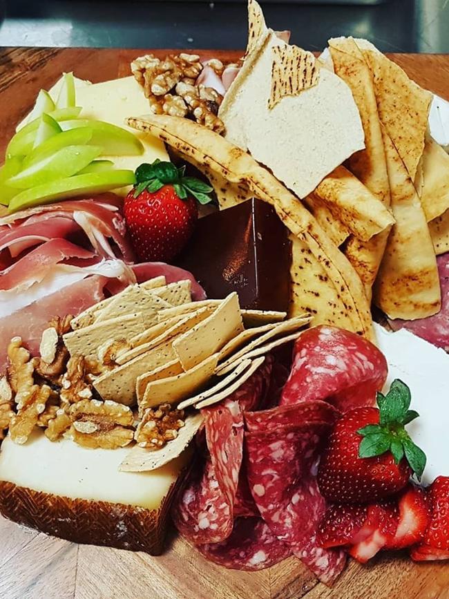 Customers can enjoy charcuterie boards all day.