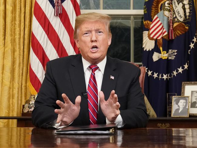 President Donald Trump speaks from the Oval Office of the White House as he gives a prime-time address about border security Tuesday, Jan. 8, 2018, in Washington. (Carlos Barria/Pool Photo via AP)