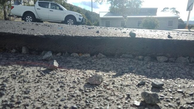 Scenes from a burst water incident at Burnette and Pioneer Streets in New Norfolk which has left some sections of road compromised. Source: MICHELLE DRACOULIS.