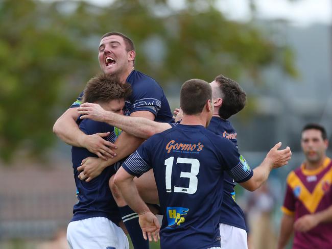 Newcastle’s Jayden Butterfield celebrates with Cameron Anderson. Picture: Sue Graham