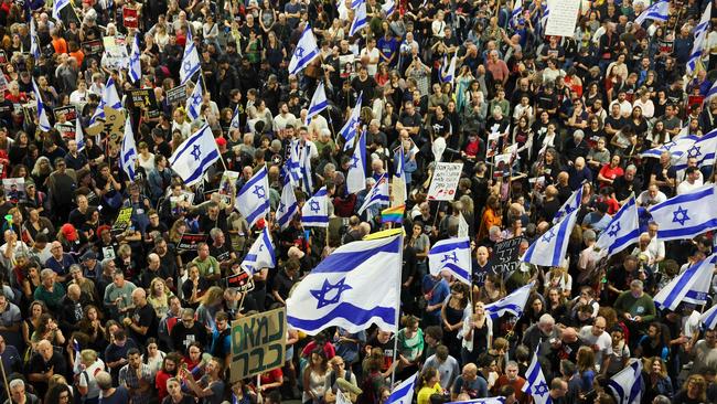 Relatives and supporters of hostages taken captive by Palestinian militants in Gaza protest on Saturday. Picture: Jack Guez/AFP