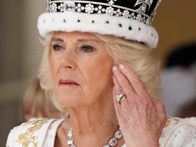 LONDON, ENGLAND - MAY 06: Queen Camilla receives a royal salute from members of the military in the gardens of Buckingham Palace following the coronation on May 6, 2023 in London, England. The Coronation of Charles III and his wife, Camilla, as King and Queen of the United Kingdom of Great Britain and Northern Ireland, and the other Commonwealth realms takes place at Westminster Abbey today. Charles acceded to the throne on 8 September 2022, upon the death of his mother, Elizabeth II. (Photo by Andrew Milligan - WPA Pool/Getty Images)