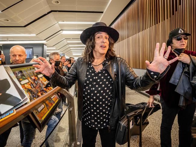 Paul Stanley signs autographs for fans upon arrival at Melbourne Airport to begin the Australian leg of the End of the Road Tour. Picture: Jake Nowakowski