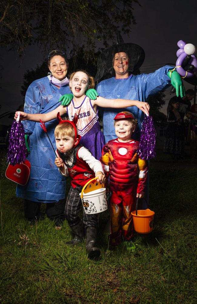 Andrea Warren (left) and Theresa Murray with kids Angus, Charlotte and Isaac trick or treating on Halloween, Thursday, October 31, 2024. Picture: Kevin Farmer