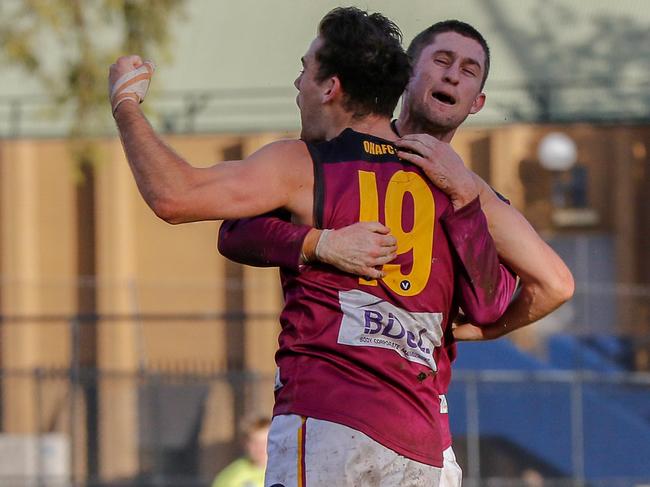 Top cricket official goes into bat for local footy