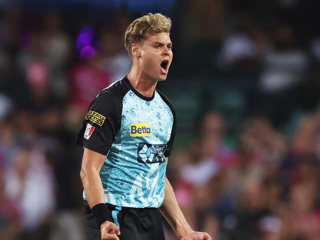 SYDNEY, AUSTRALIA - JANUARY 24:  Spencer Johnson of the Heat celebrates taking the wicket of Jack Edwards of the Sixers during the BBL Final match between Sydney Sixers and Brisbane Heat at Sydney Cricket Ground, on January 24, 2024, in Sydney, Australia. (Photo by Matt King/Getty Images)