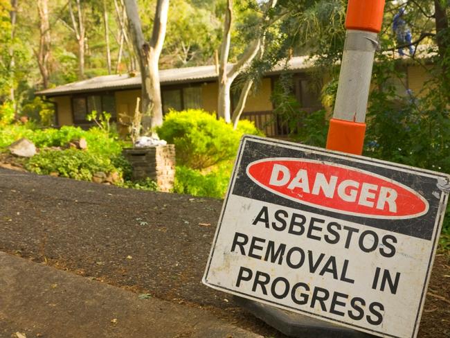 Generic asbestos removal sign outside a home containing the material. Picture: Asbestos Awareness