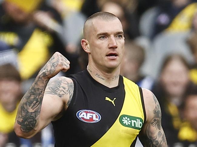 MELBOURNE, AUSTRALIA - AUGUST 19: Dustin Martin of the Tigers celebrates kicking a goal during the round 23 AFL match between Richmond Tigers and North Melbourne Kangaroos at Melbourne Cricket Ground, on August 19, 2023, in Melbourne, Australia. (Photo by Daniel Pockett/Getty Images)