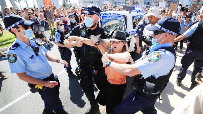 NSW Police detain a woman at the border. Picture: NCA NewsWire/Scott Powick